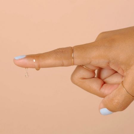 Fler kapky proti zárůstání chloupků a podráždění Hoily Drops s peelingovou rukavicí, 14ml